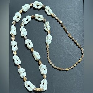 64.  Continuous Strand Shell Necklace